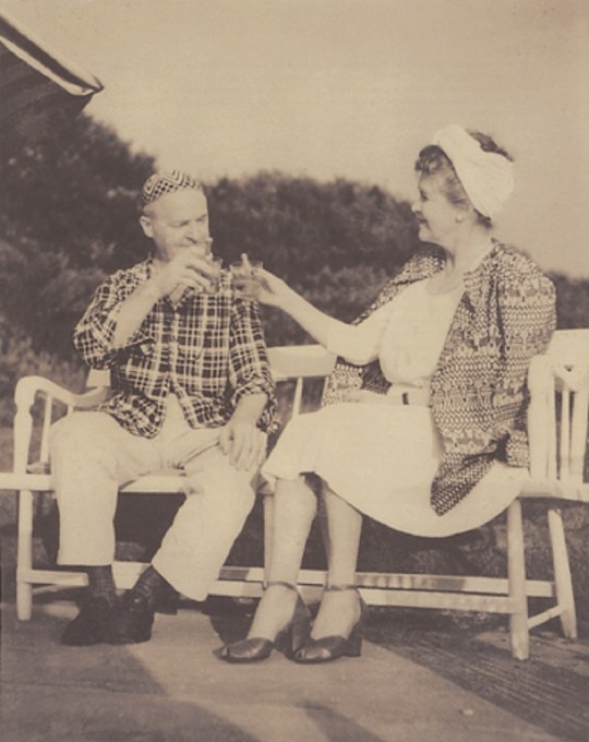 Gerald and Sara Murphy toast each other at Swan Cover, their home in East Hampton, ca. 1963 (Photographer unknown)